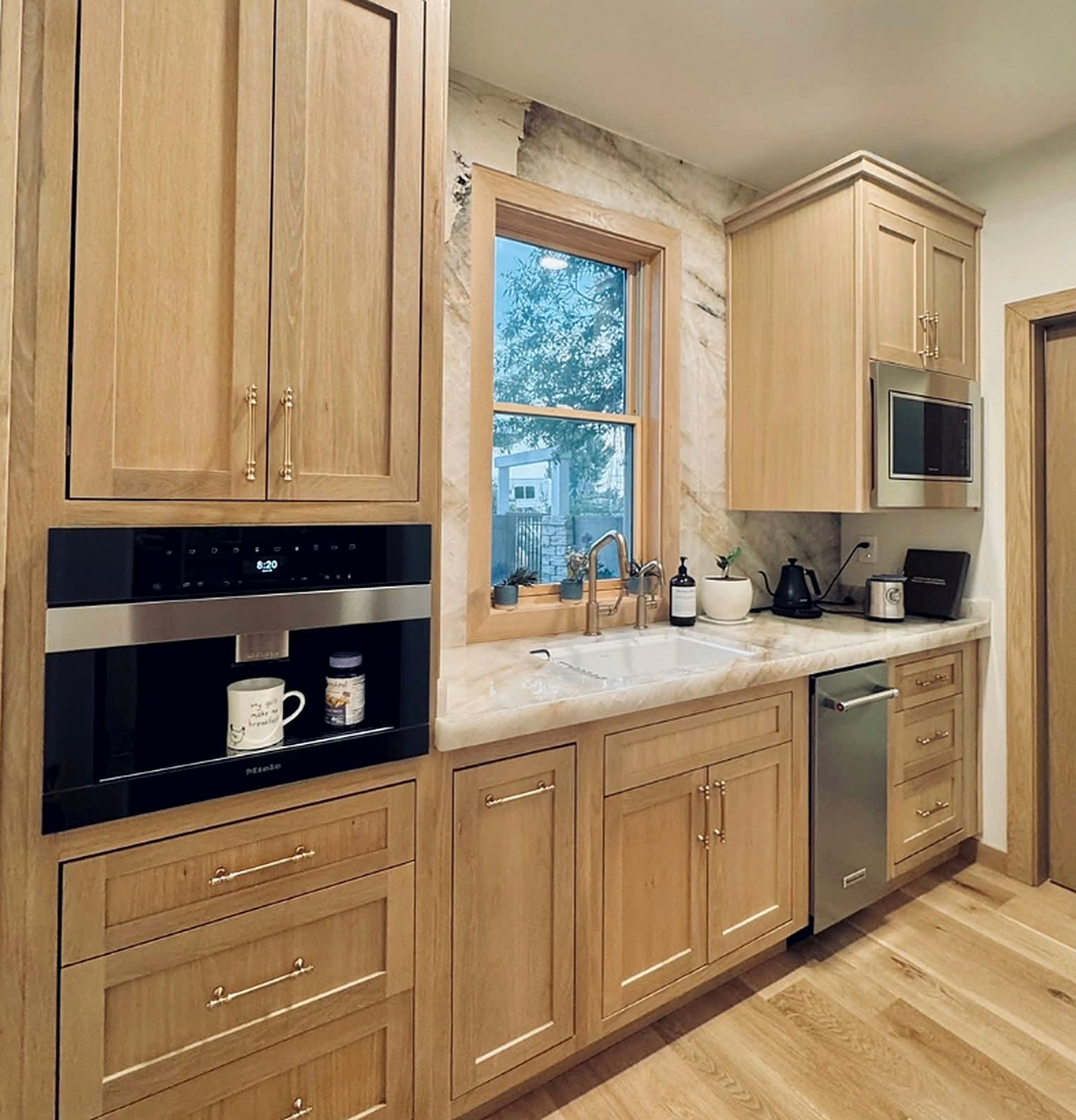 White oak kitchen with built-in coffee station
